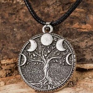 Collar for men or women🎁 Tree of life with the faces of the moon.